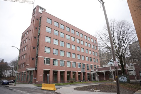 tompkins county mental health services building, winter time, trees without leaves